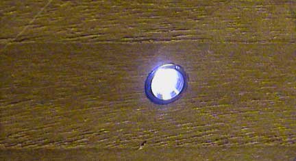 microstar in a teak wall