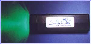 green and white mil skylite led flashlight